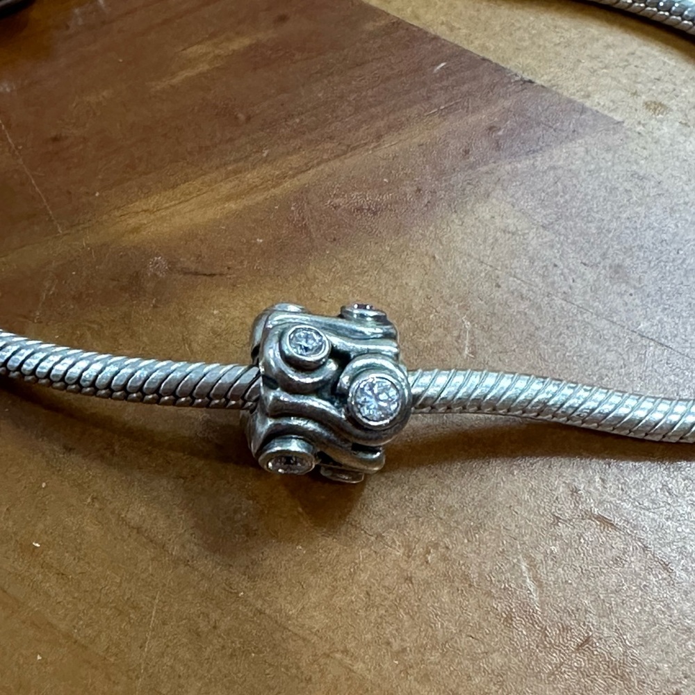 Pandora Retired “Ocean Wave” Charm Bead with clear CZ’s